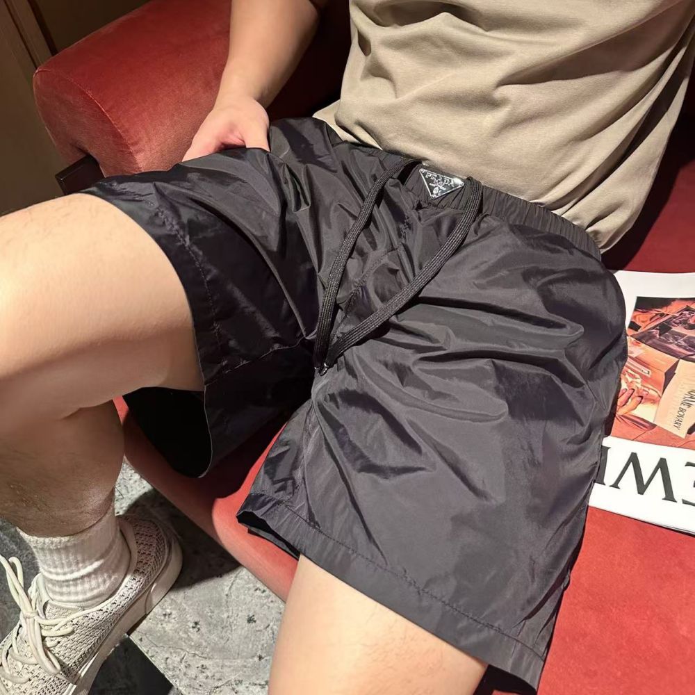 [프라다] PRADA 트라이앵글 로고 비치 쇼츠